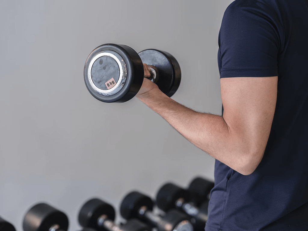 "Various protein powder containers, showcasing different brands and flavors for fitness enthusiasts."